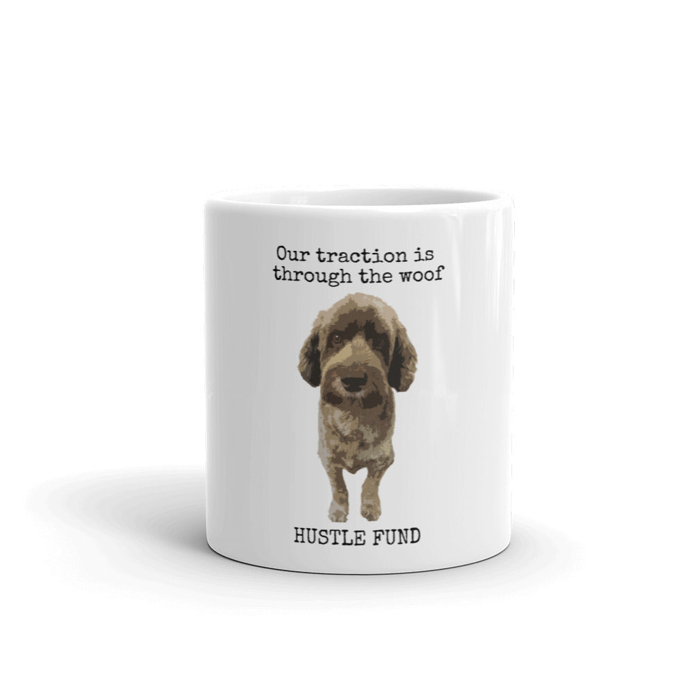 Our Traction is Through the Woof Mug